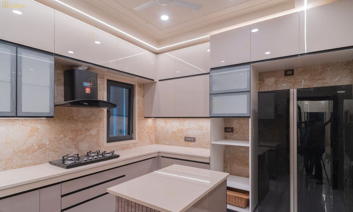 Modular kitchen with an island and marble backsplash — Aurelia, Varanasi